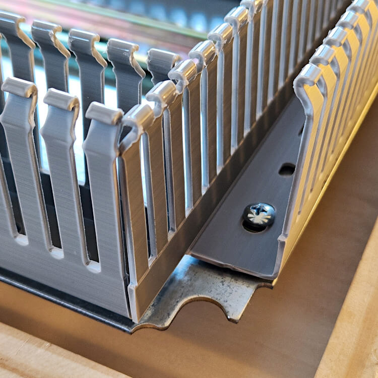 Finished mounting plate with cutouts